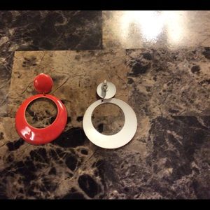 Large orange clip on hoop earrings